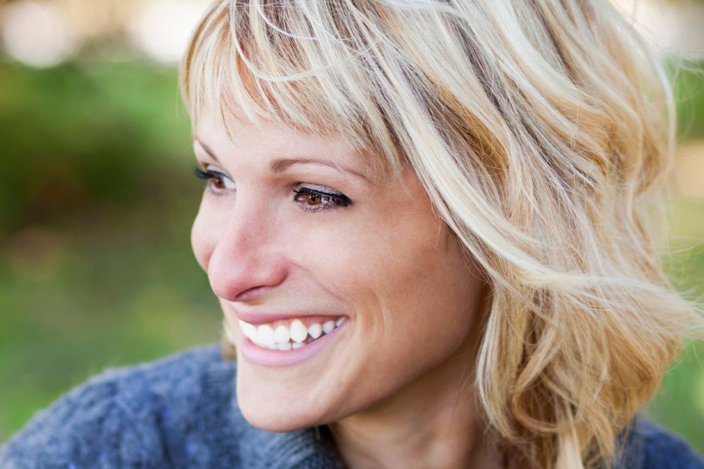 Photo of smiling blonde woman